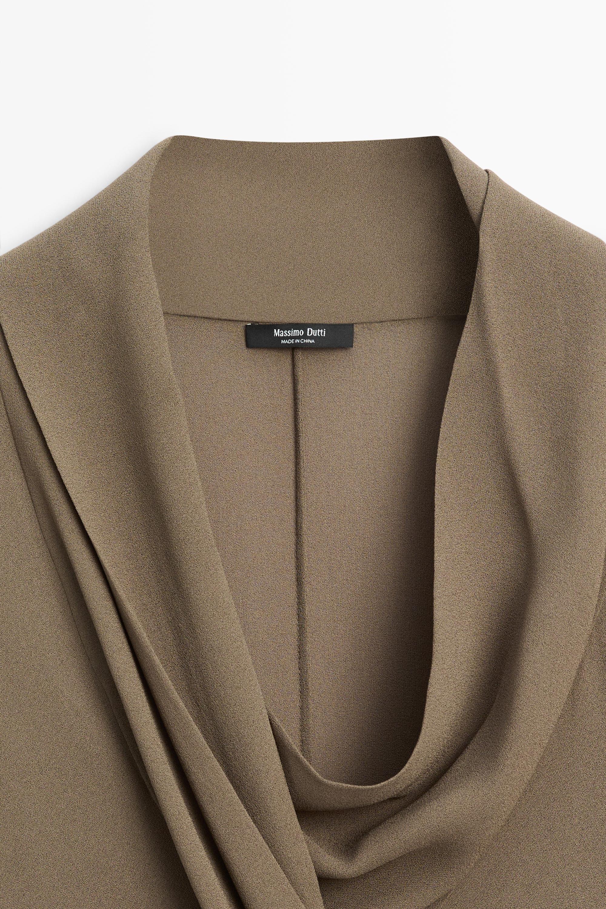 Flowy surplice draped neckline shirt
